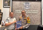 Jasa Raharja Sumatera Barat Serahkan Buku Action Plan SWDKLLJ kepada Dirlantas Polda Sumbar, Perkuat Transformasi Pelayanan